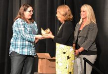 Sanford Aberdeen’s Angie Herrick, center, receives a HEN 2.0 award from Sheena Thomas, left, and Nancy McDonald.Hen Award
