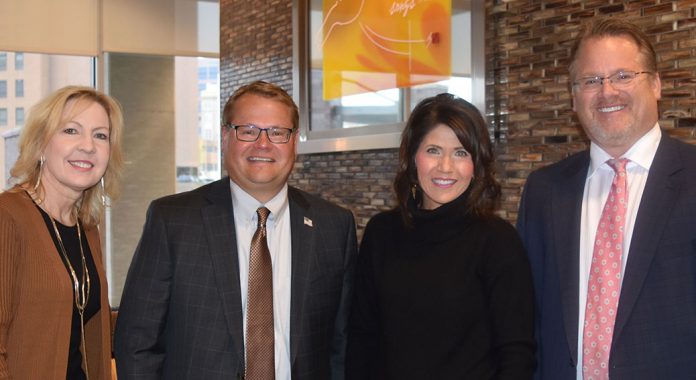 U.S. Rep. Kristi Noem, third from left, receives a $2,500 AHAPAC check from Debra A. Owen, SDAHO vice president of state and federal relations (left), Scott A. Duke, SDAHO president and CEO (second from left) and Paul Hanson, SDAHO board member and CEO of Sanford USD Medical Center (right).
