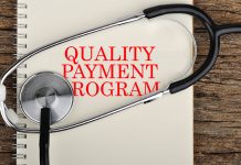Quality Payment Program on Notebook With Stethoscope