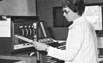 Lady inputting data for the Iowa Health Services Data System