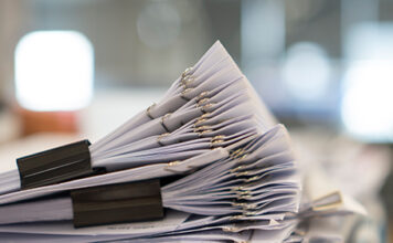 Stack of papers for the controversial malpractice tort reform legislation