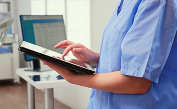 Medical expert working in the electronic health record system